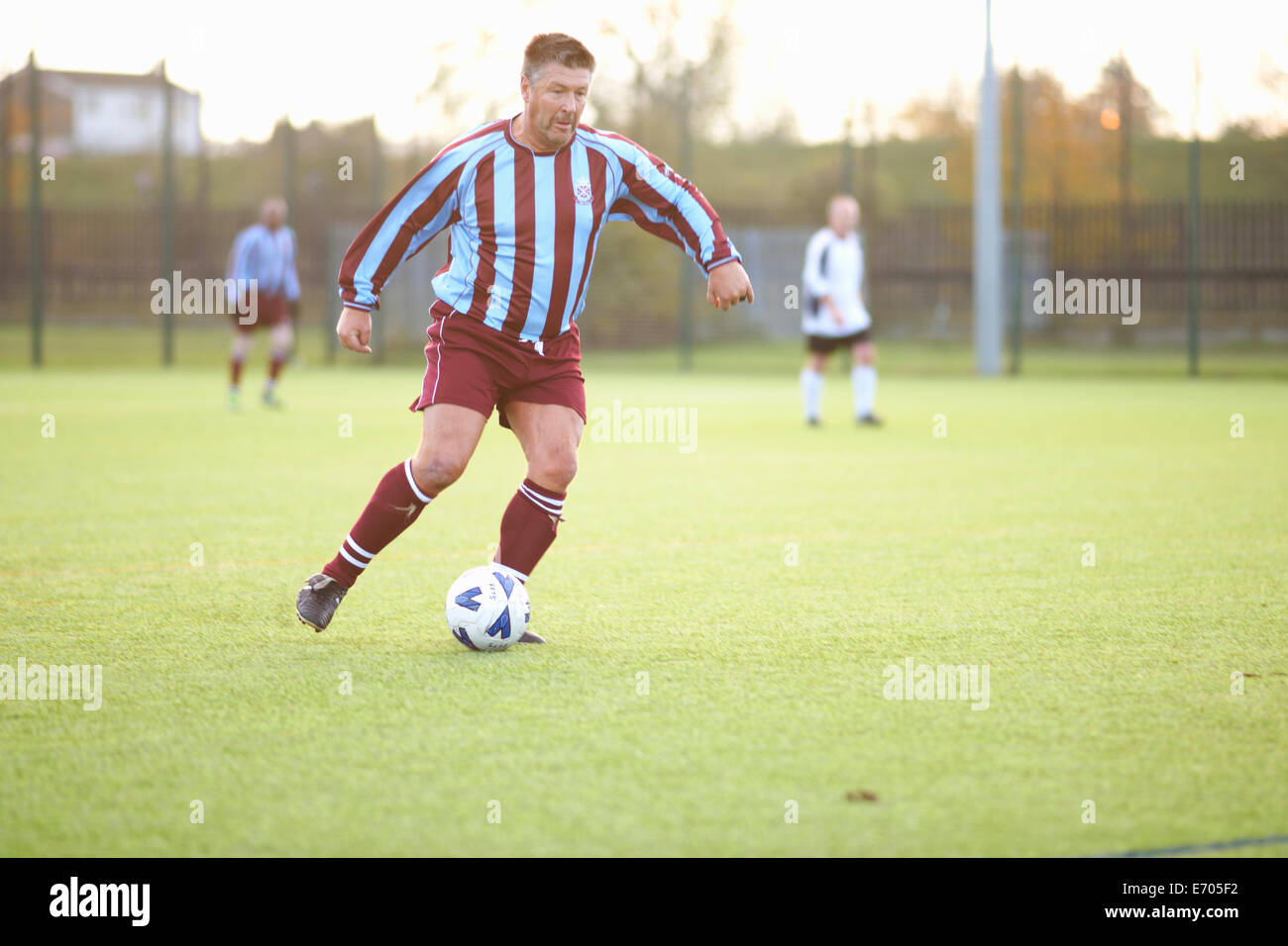 Fußball Spieler munter Stockfoto