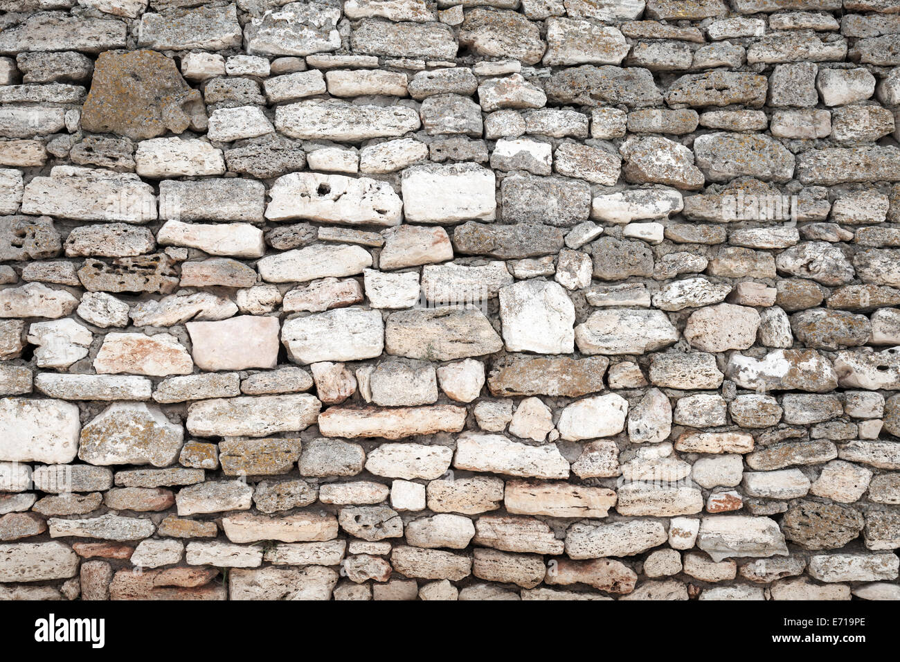 Alte graue Steinmauer Hintergrundtextur Foto Stockfoto