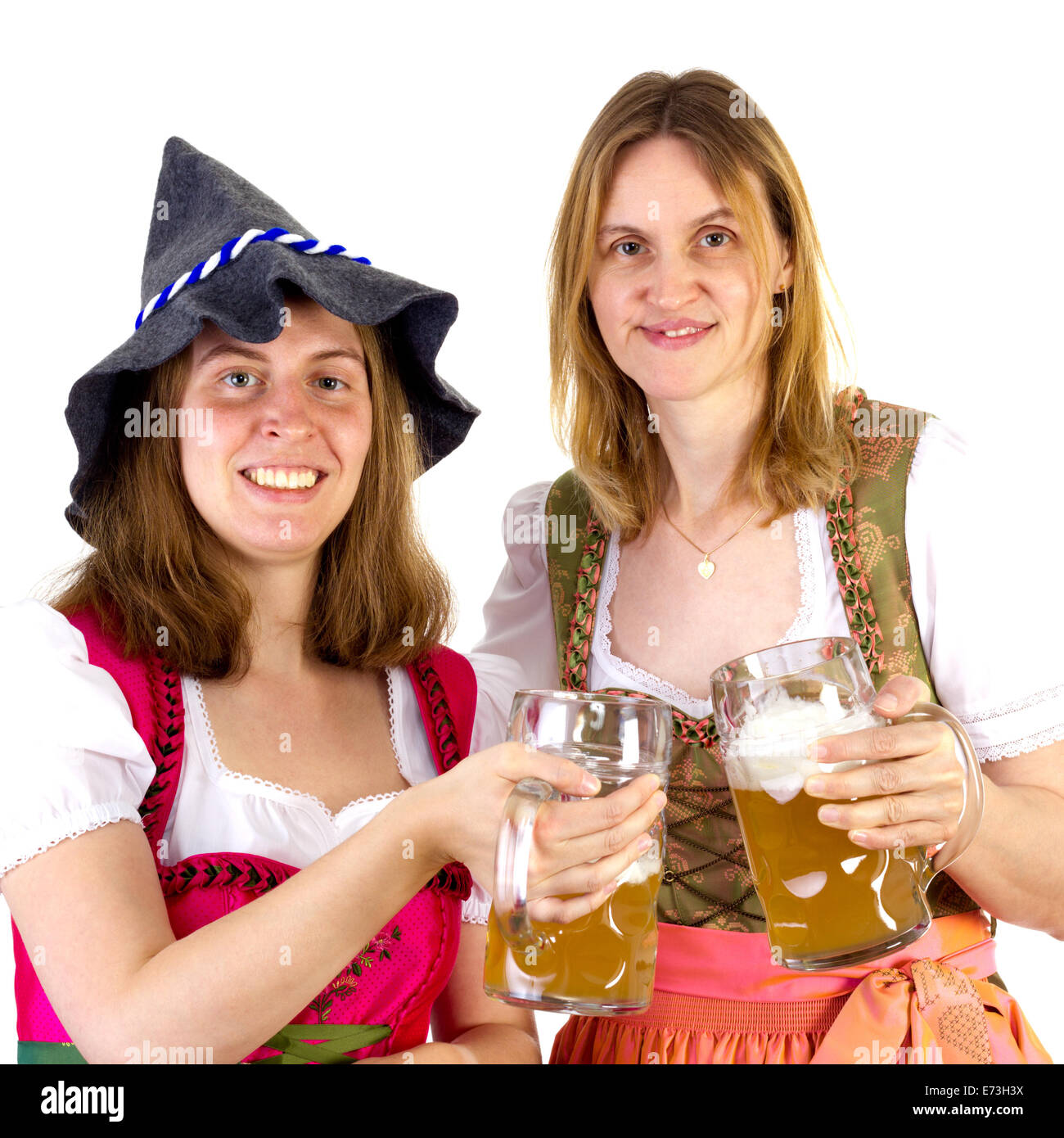 Frauen im Dirndl klirrende Gläser Stockfoto