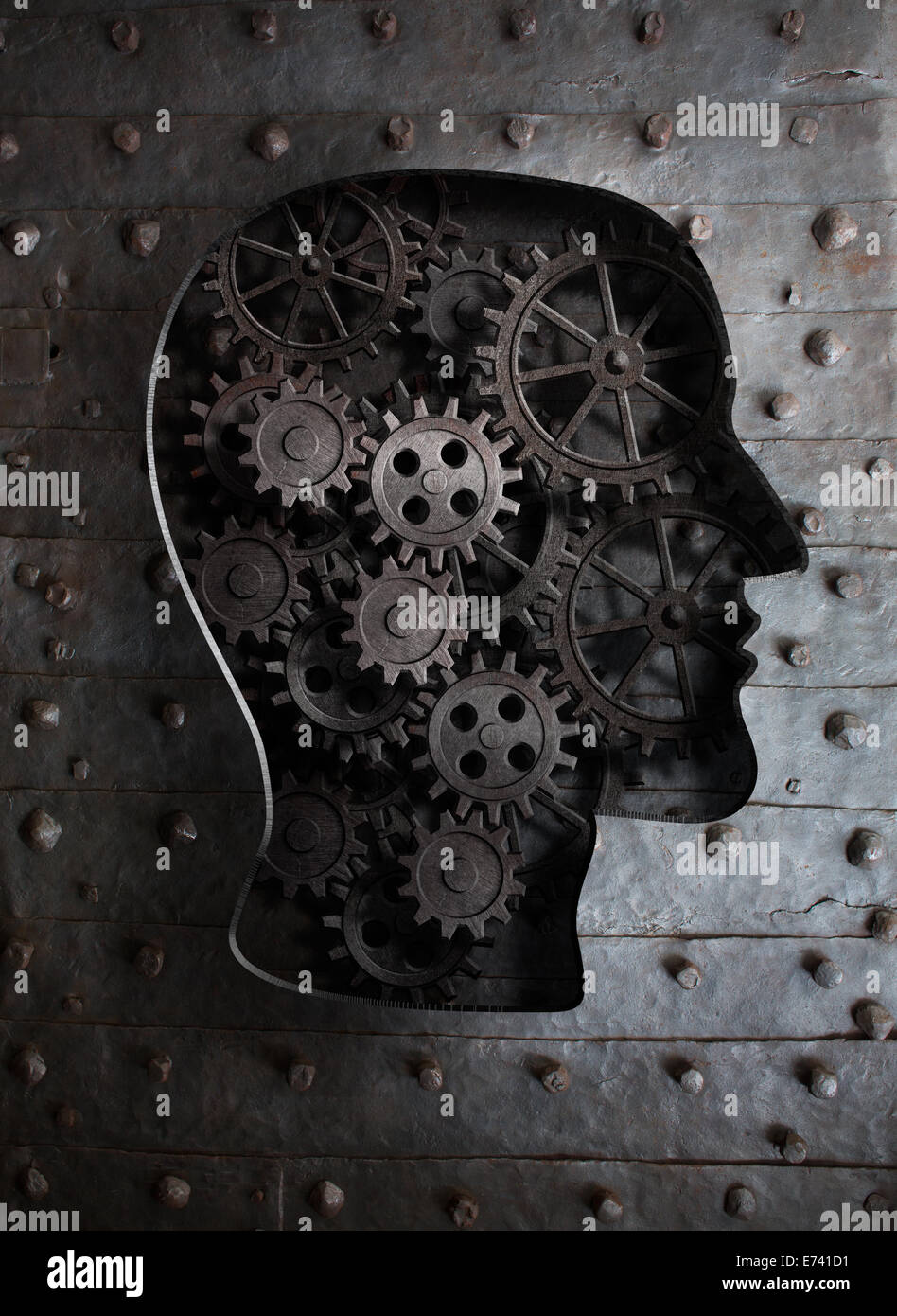 Gehirn-Konzept: Metall-Getriebe und Zahnräder in menschlicher Kopf Stockfoto