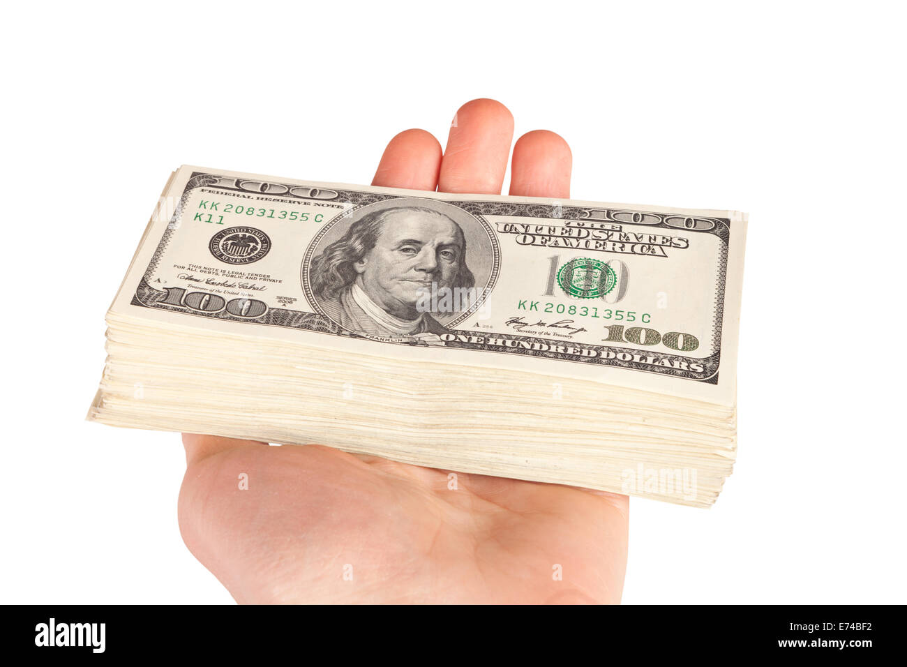 große Haufen Geld (US-Dollar) in der hand Stockfoto