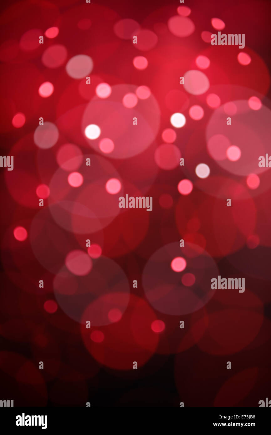 roten Bokeh Hintergrund erstellt von Weihnachtsbeleuchtung Stockfoto