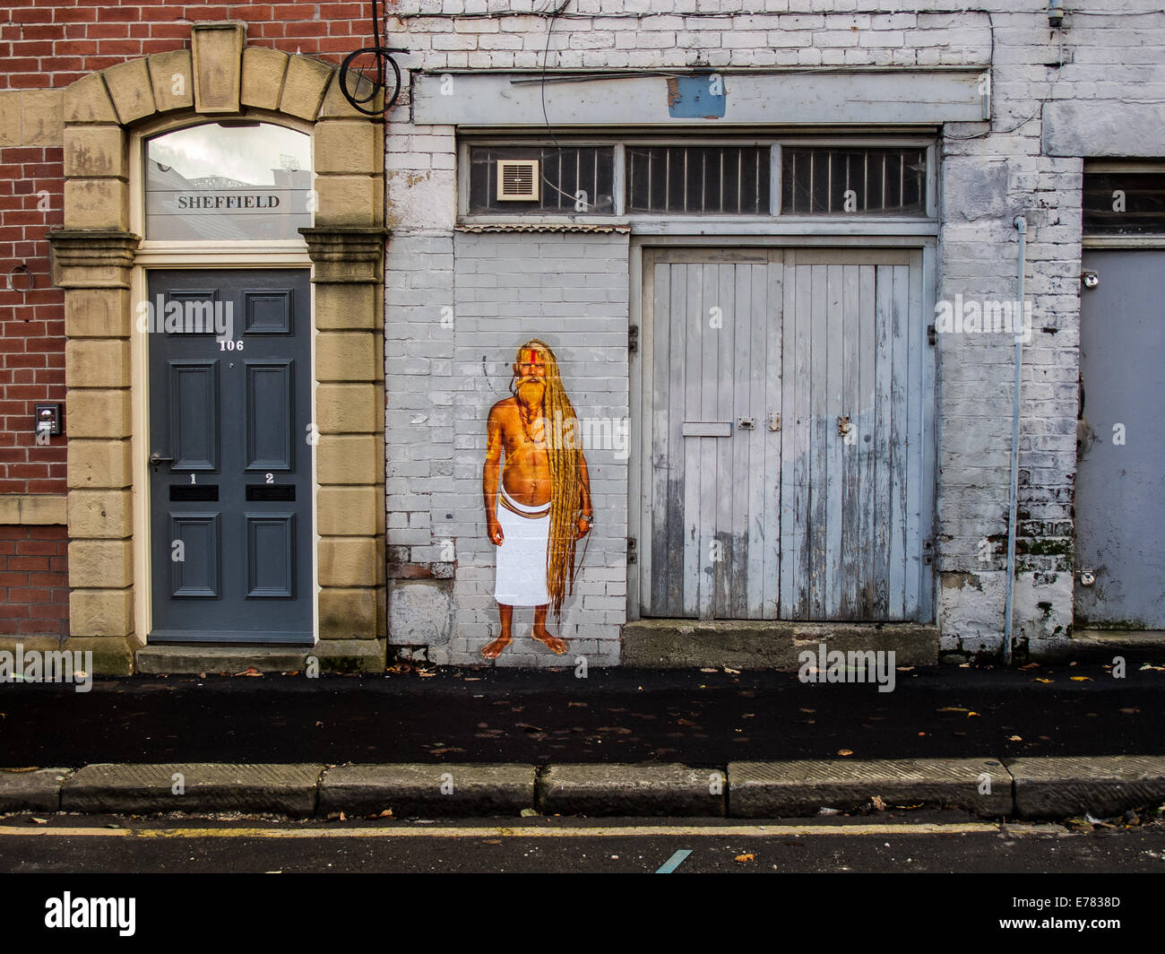 Sadhu Paste-up street-Art Künstlers Alex Ekins in Mary Street Sheffield South Yorkshire UK Stockfoto
