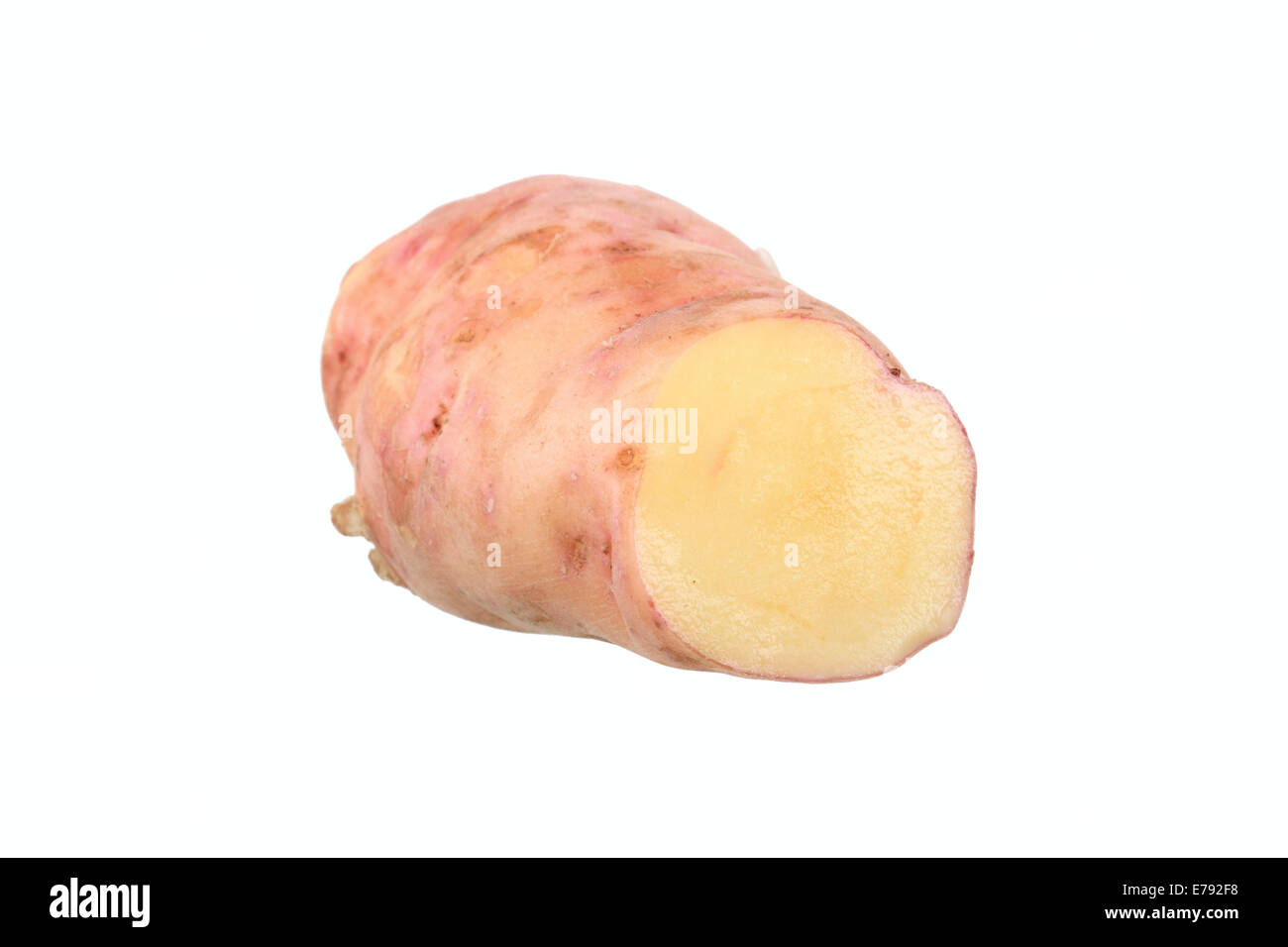 Kartoffel, rosa Feuer Apfelsorte, in zwei Hälften geschnitten Stockfoto