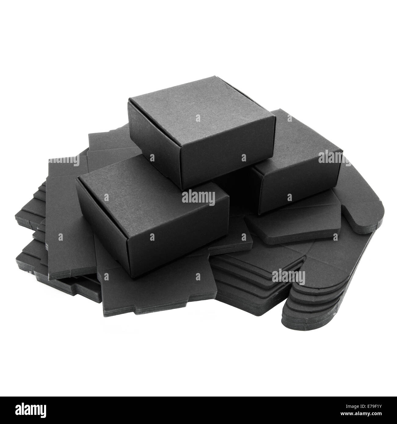 Faltbare schwarzes Papier-Boxen auf einem weißen Hintergrund. Stockfoto