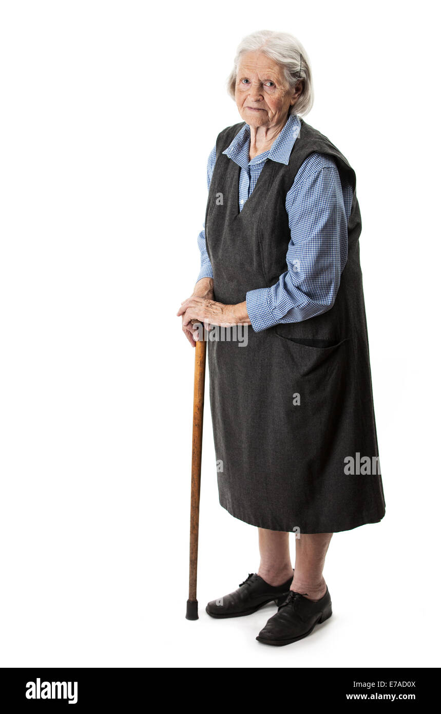 Alte Frau mit einem Stock auf weißem Hintergrund Stockfotografie - Alamy