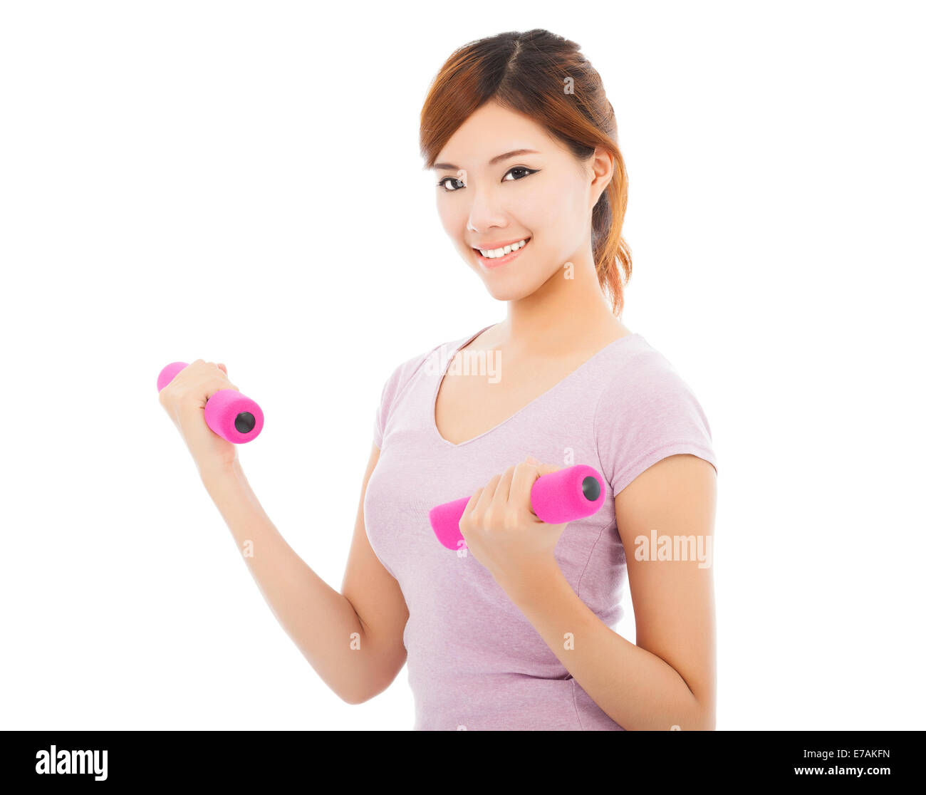 Junge Frau Workout mit Hanteln in die Hände Stockfoto