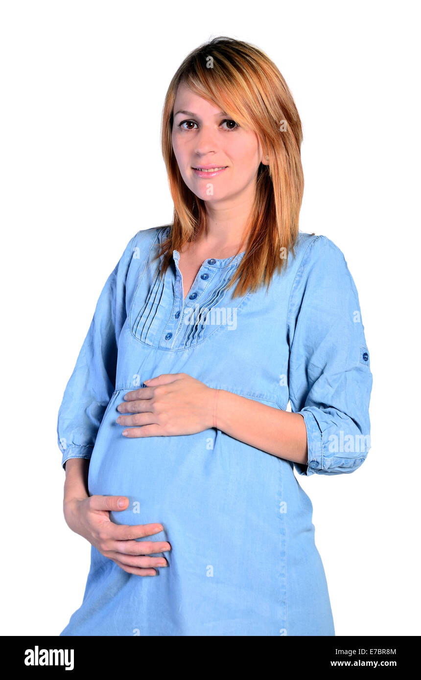 junge Frau Vorfreude Schwangerschaft auf weißem Hintergrund Stockfoto