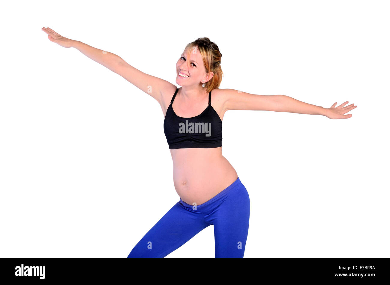 Isolierte junge schwangere Frau sport Stockfoto