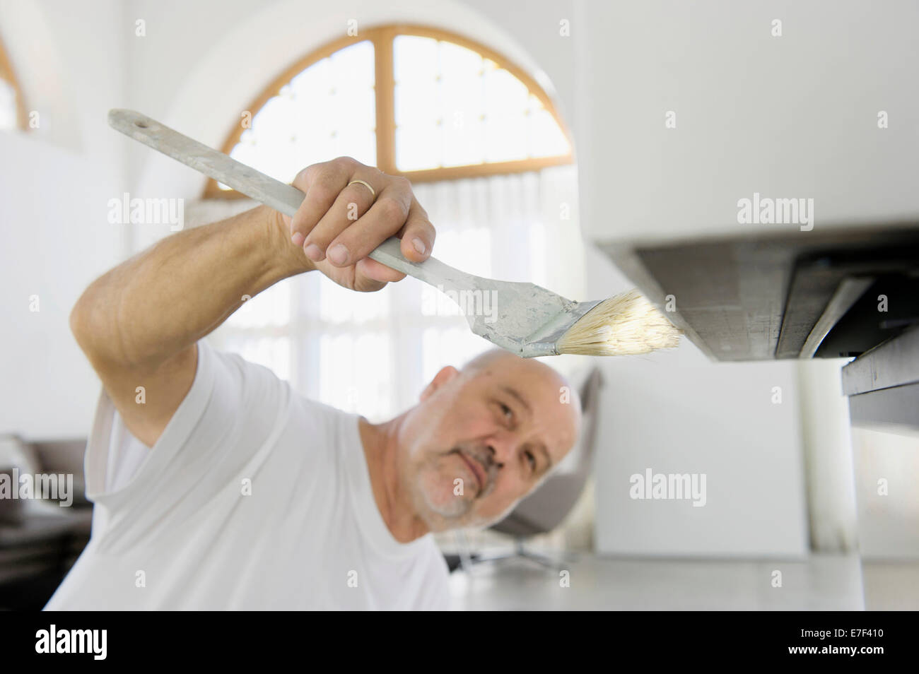 Ältere Handwerker eine Oberfläche Stockfoto