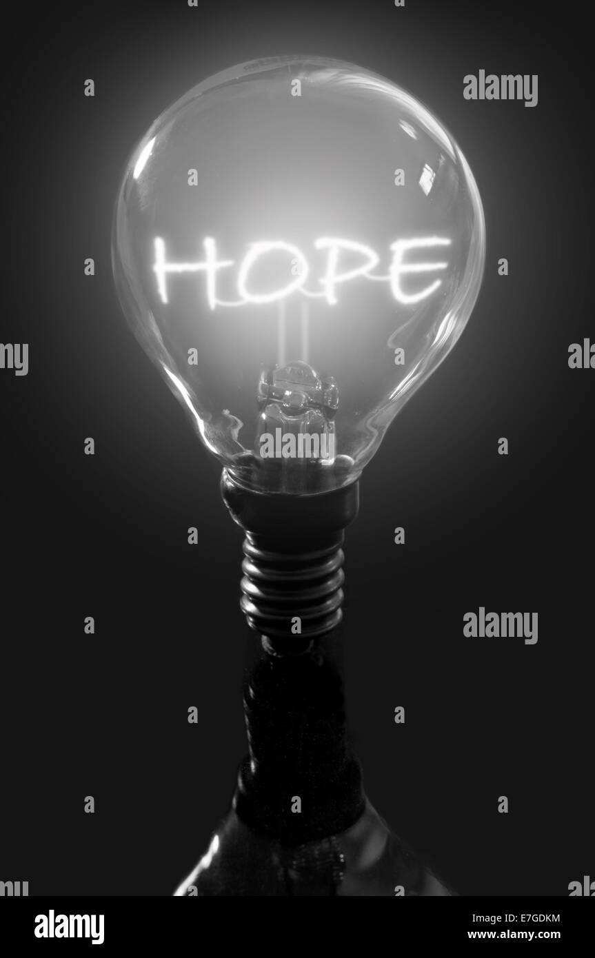 Beleuchtete Hoffnung Zeichen in einer Glühbirne Stockfoto