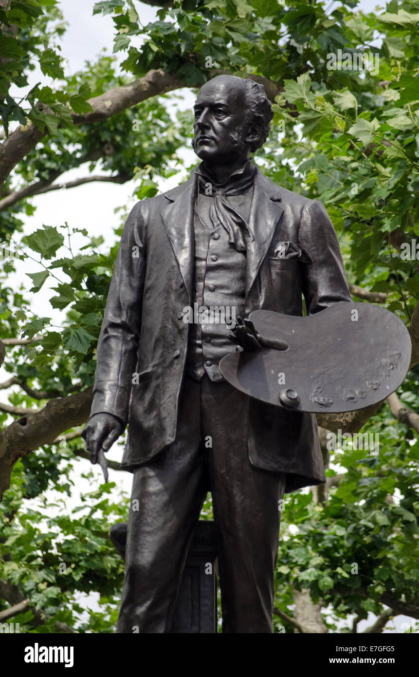 Statue des großen viktorianischen Künstlers John Everett Millais öffentlich zur Schau außerhalb Galerie Tate Britain in Pimlico, London. Stockfoto