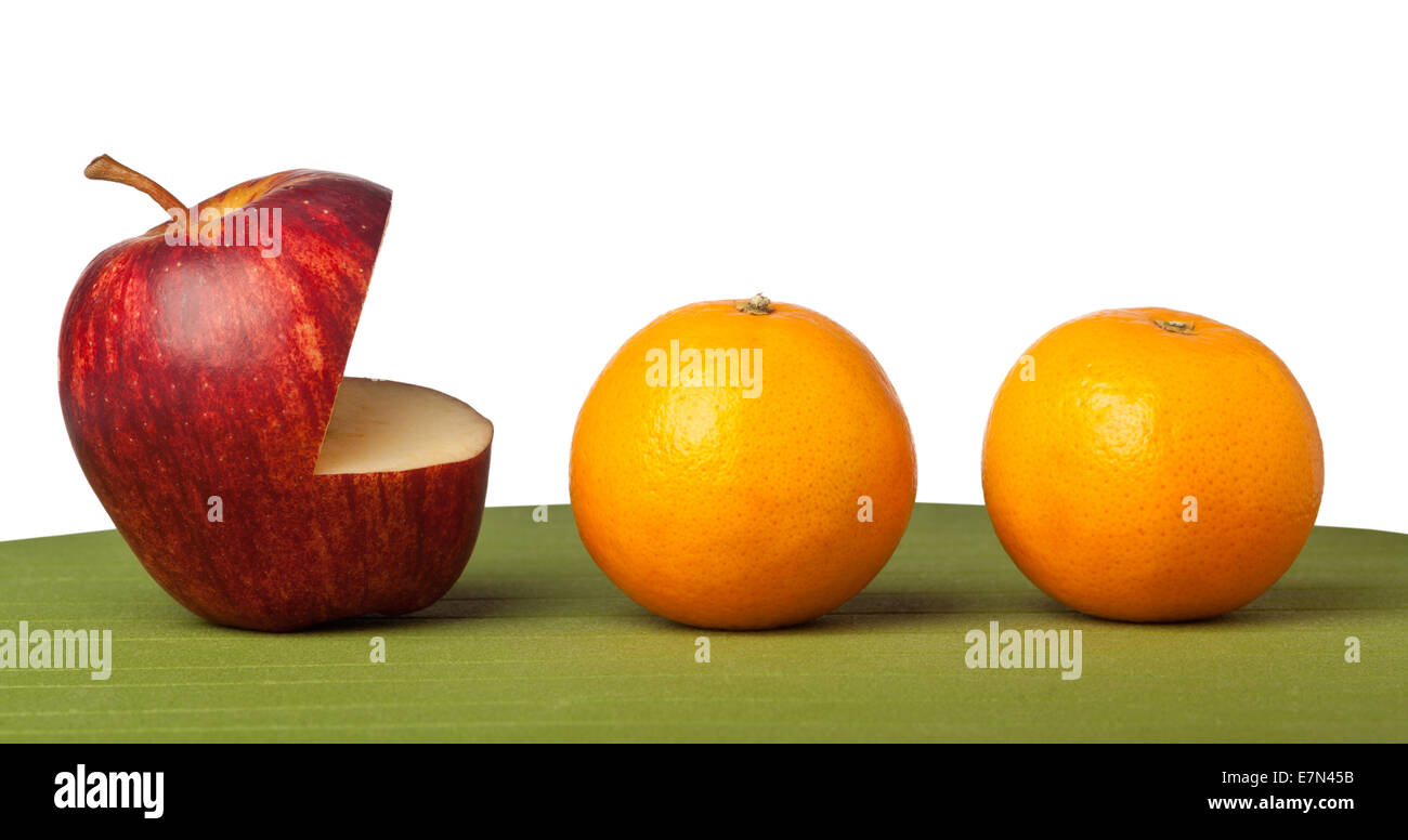 Metapher des Apple-Monster nach Orangen Stockfoto