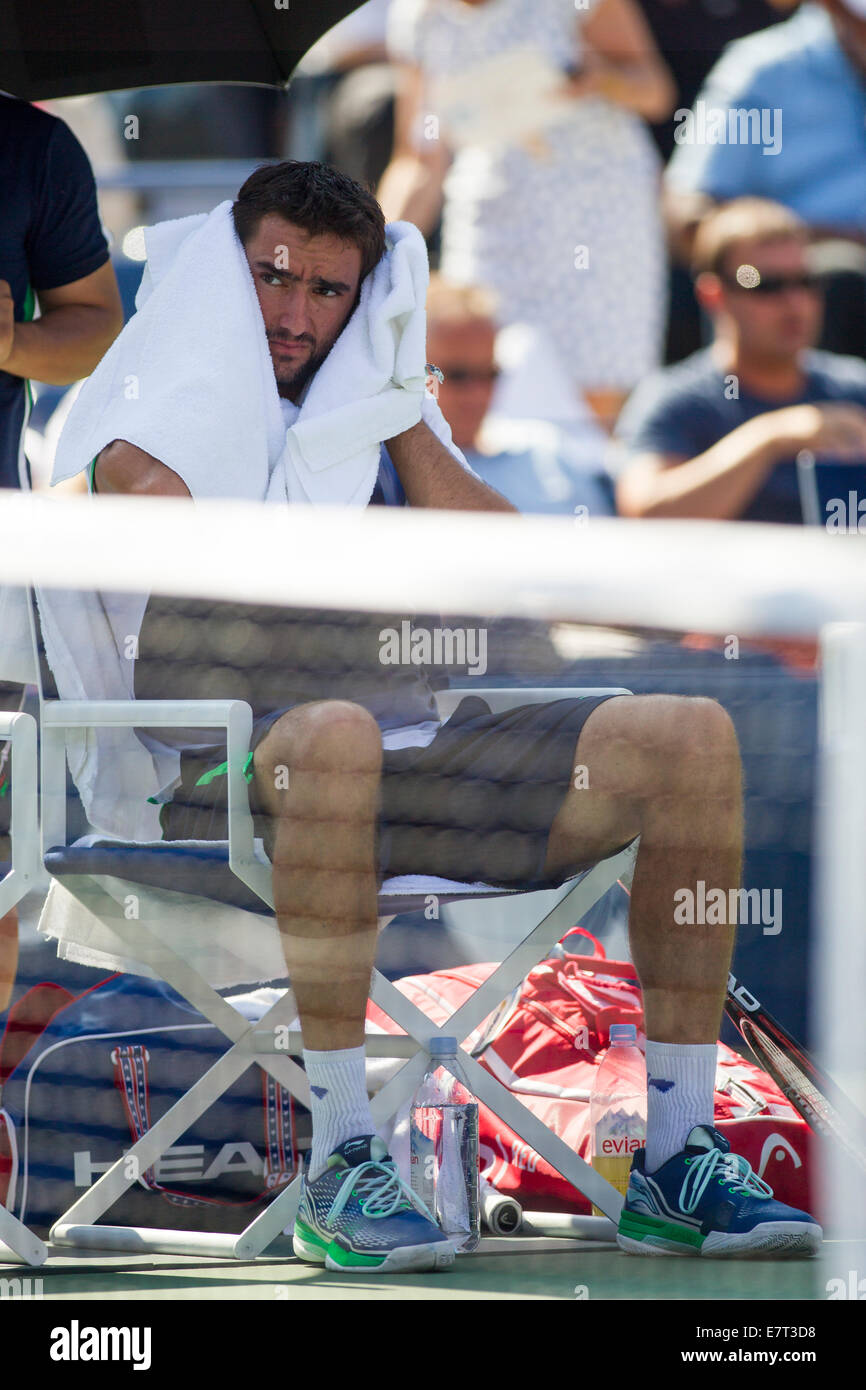 Marin Cilic (CRO) im Viertelfinale Aktion gegen Tomas Berdych (CZE) auf die 2014 US Open Tennis Championships. © Paul J. Sutton/PCN Stockfoto