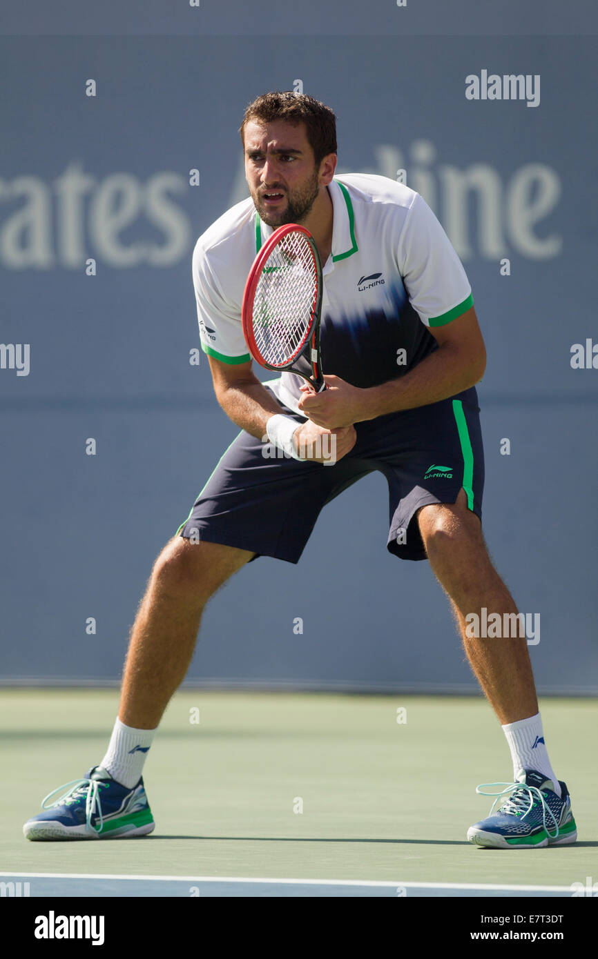 Marin Cilic (CRO) im Viertelfinale Aktion gegen Tomas Berdych (CZE) auf die 2014 US Open Tennis Championships. © Paul J. Sutton/PCN Stockfoto