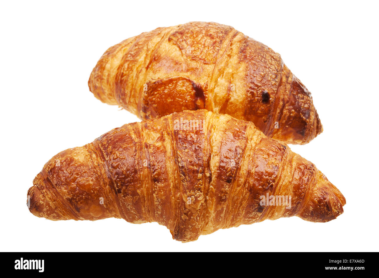 Frische Croissants auf dem weißen Hintergrund isoliert Stockfoto