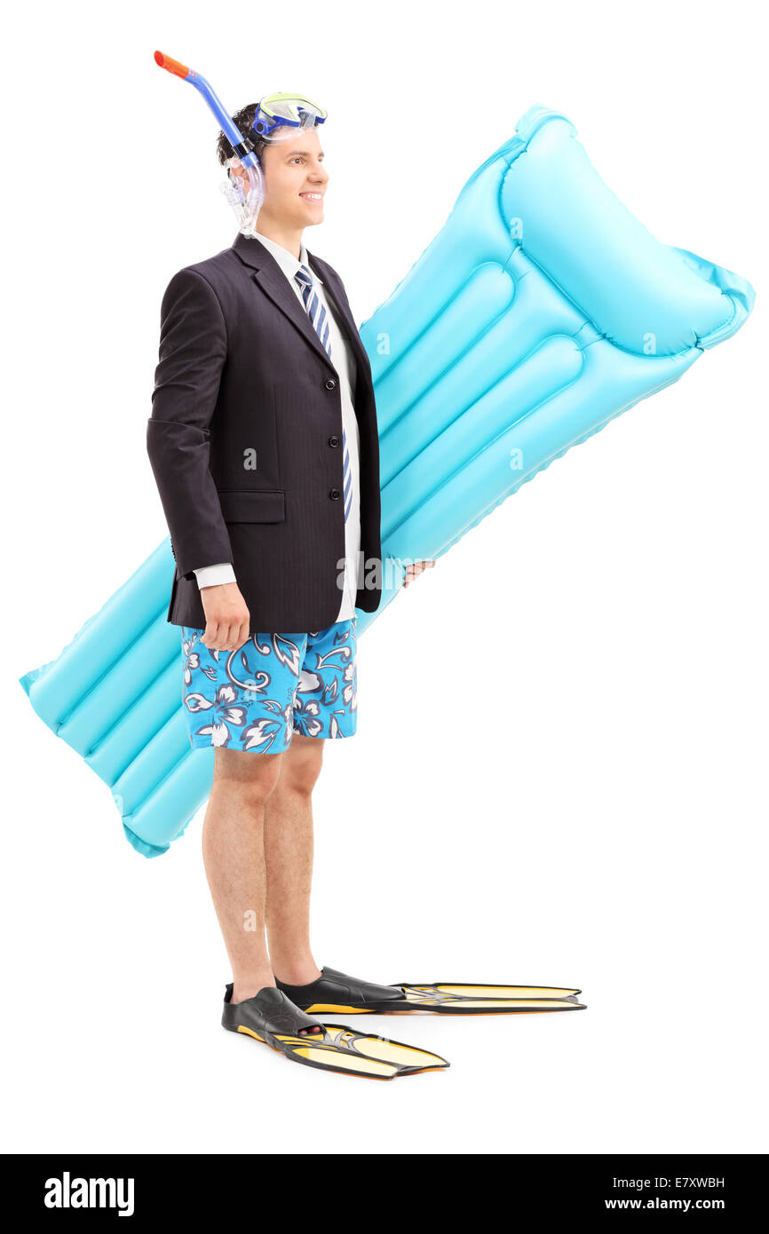 Mann mit Anzug und Schnorchel tragen schwimmen Matratze isoliert auf weißem Hintergrund Stockfoto