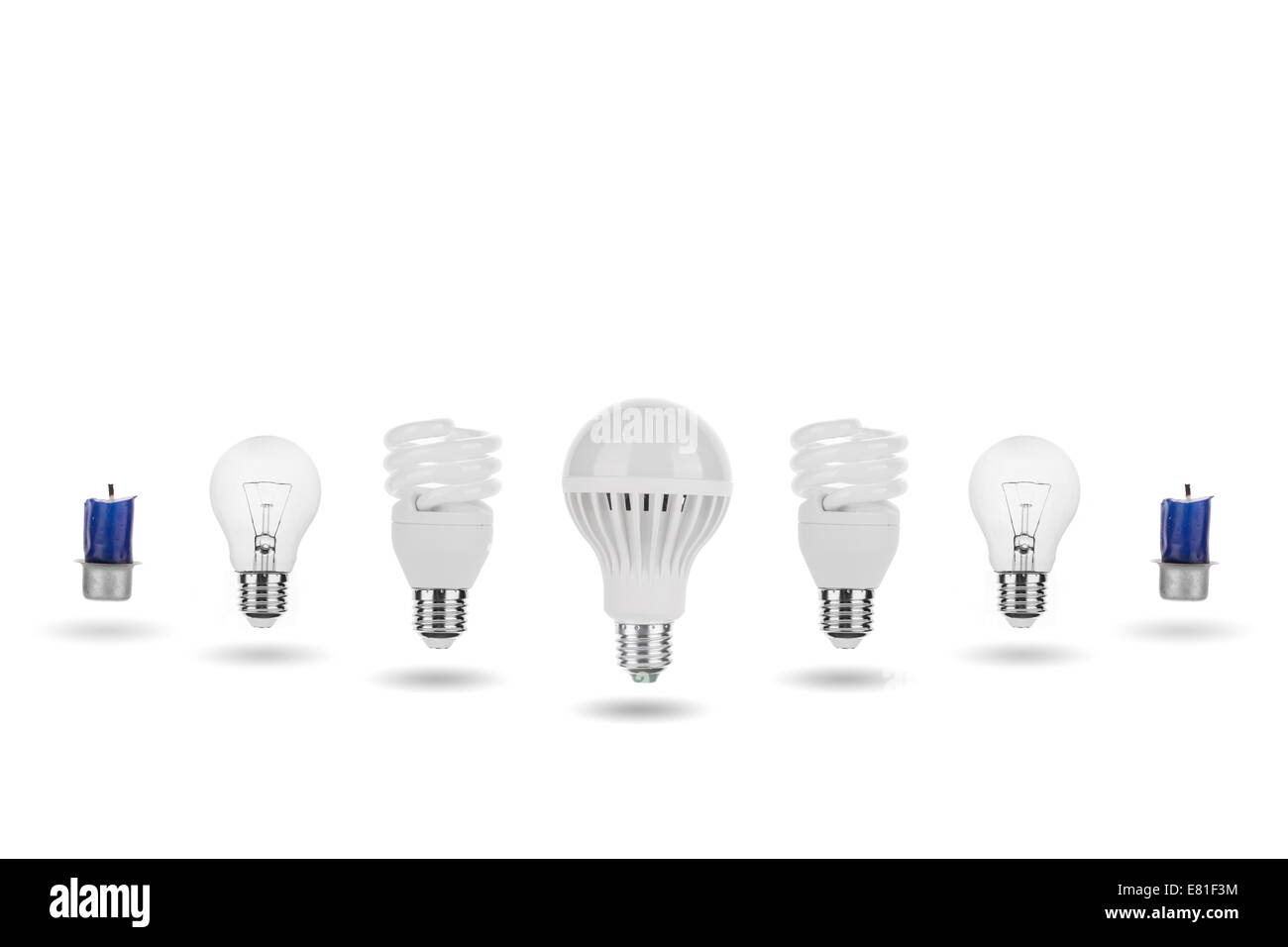 Evolution - LED-Birne, Leuchtstoffröhre, Wolfram-Lampe, Kerze Konzept Stockfoto