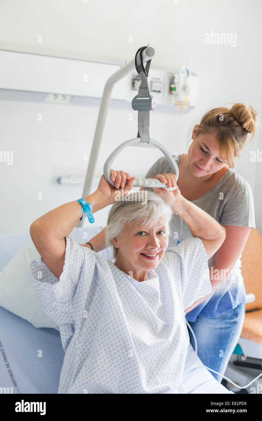 Frau im Krankenzimmer. Stockfoto