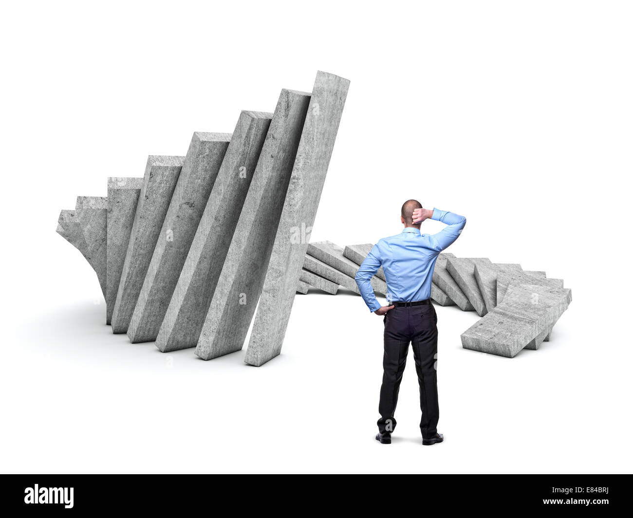 Man schaut riesige Betonwände fallen Stockfoto