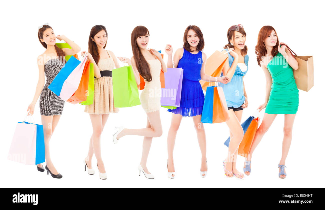 Happy shopping Asiatinnen mit Farbe Taschen. isoliert auf weißem Hintergrund Stockfoto