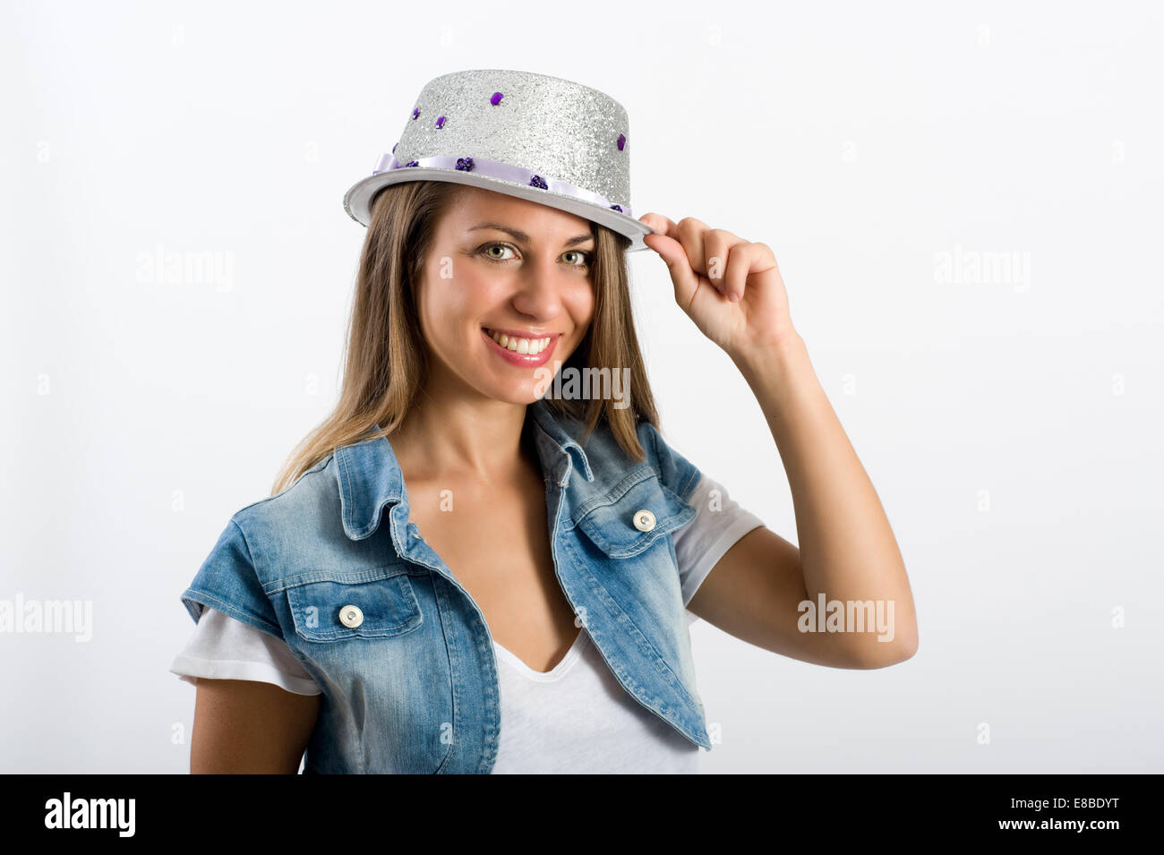 Junges Mädchen mit silbernen Clown Hut Stockfoto