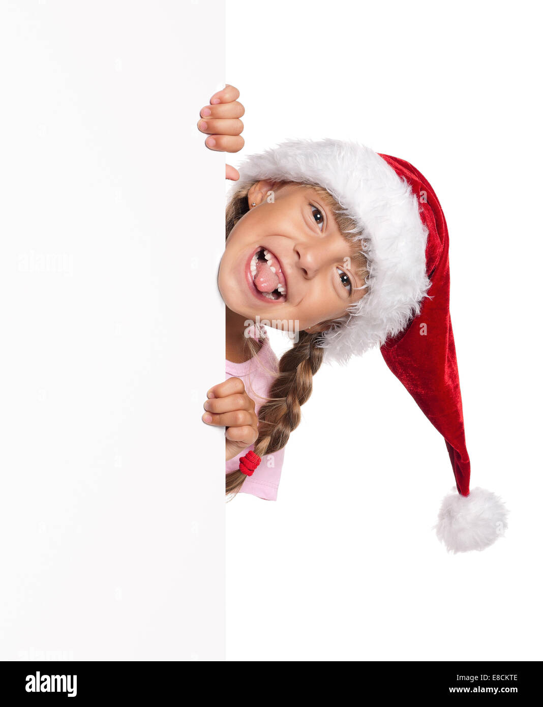 Kleines Mädchen mit Weihnachtsmütze Stockfoto