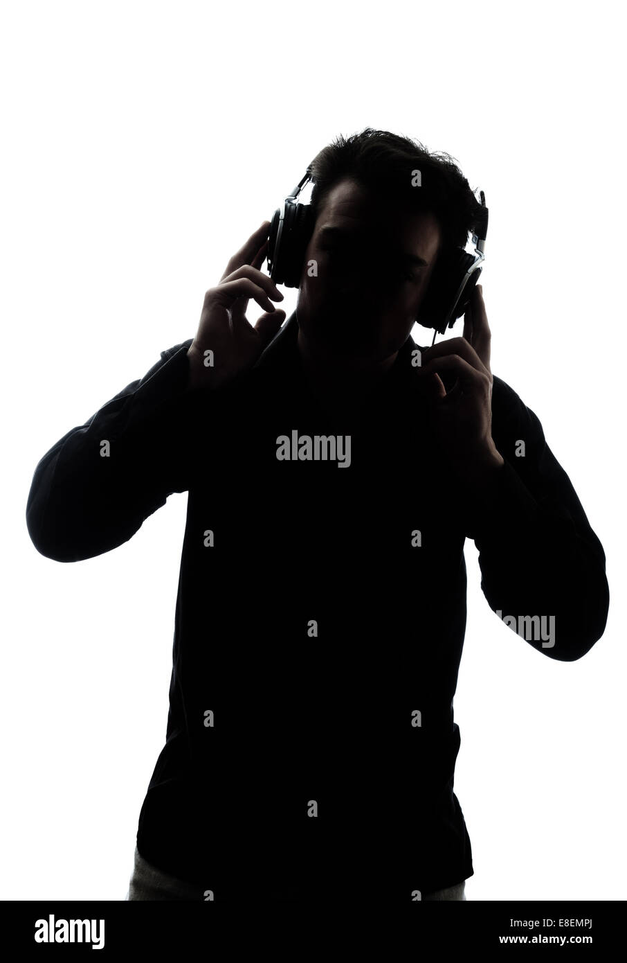 Männliche Silhouette isoliert auf weißem Hintergrund Kopfhörer anhören Stockfoto
