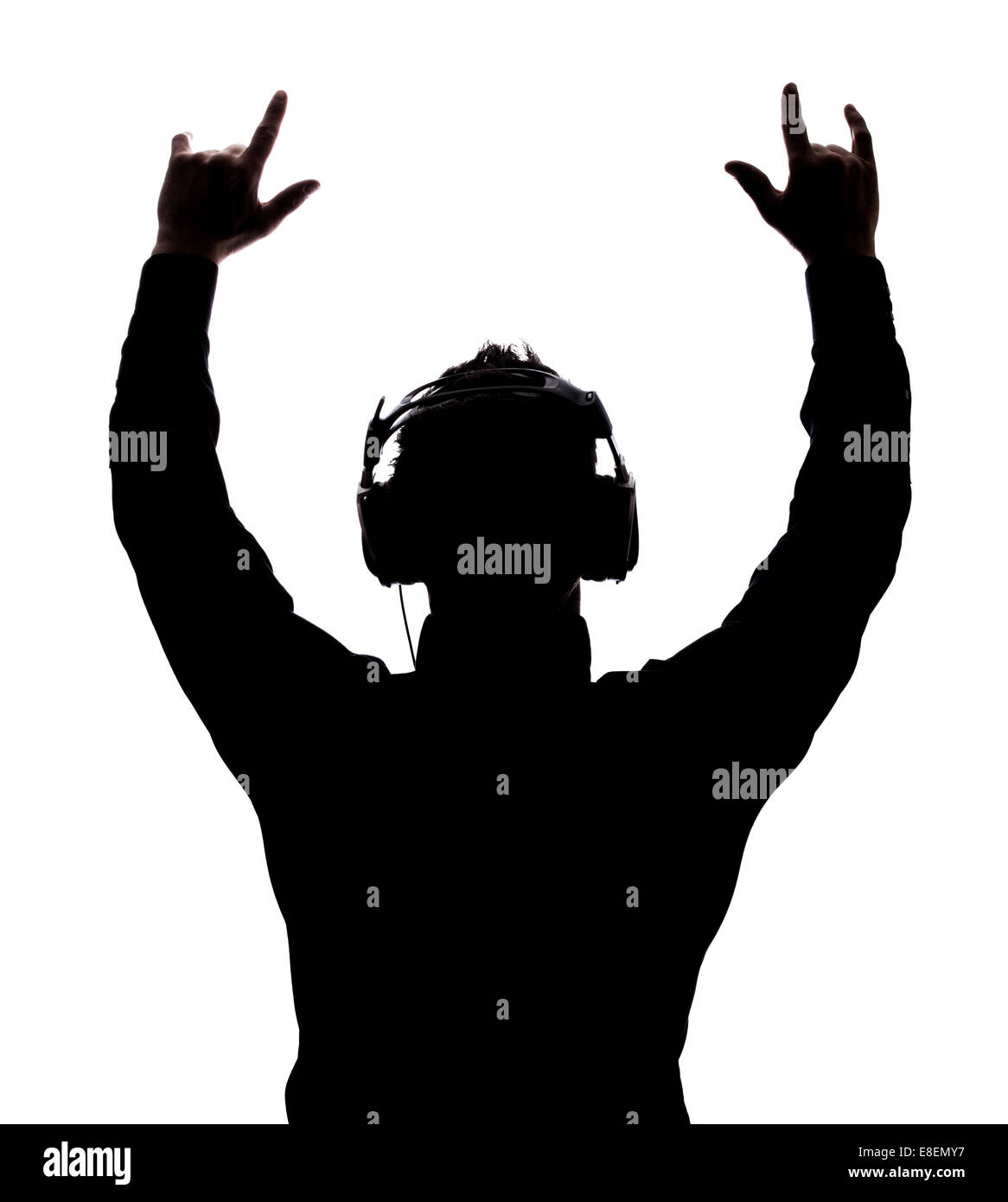 Mann, Schaukeln auf mit Kopfhörern in der Silhouette isoliert auf weißem Hintergrund Stockfoto