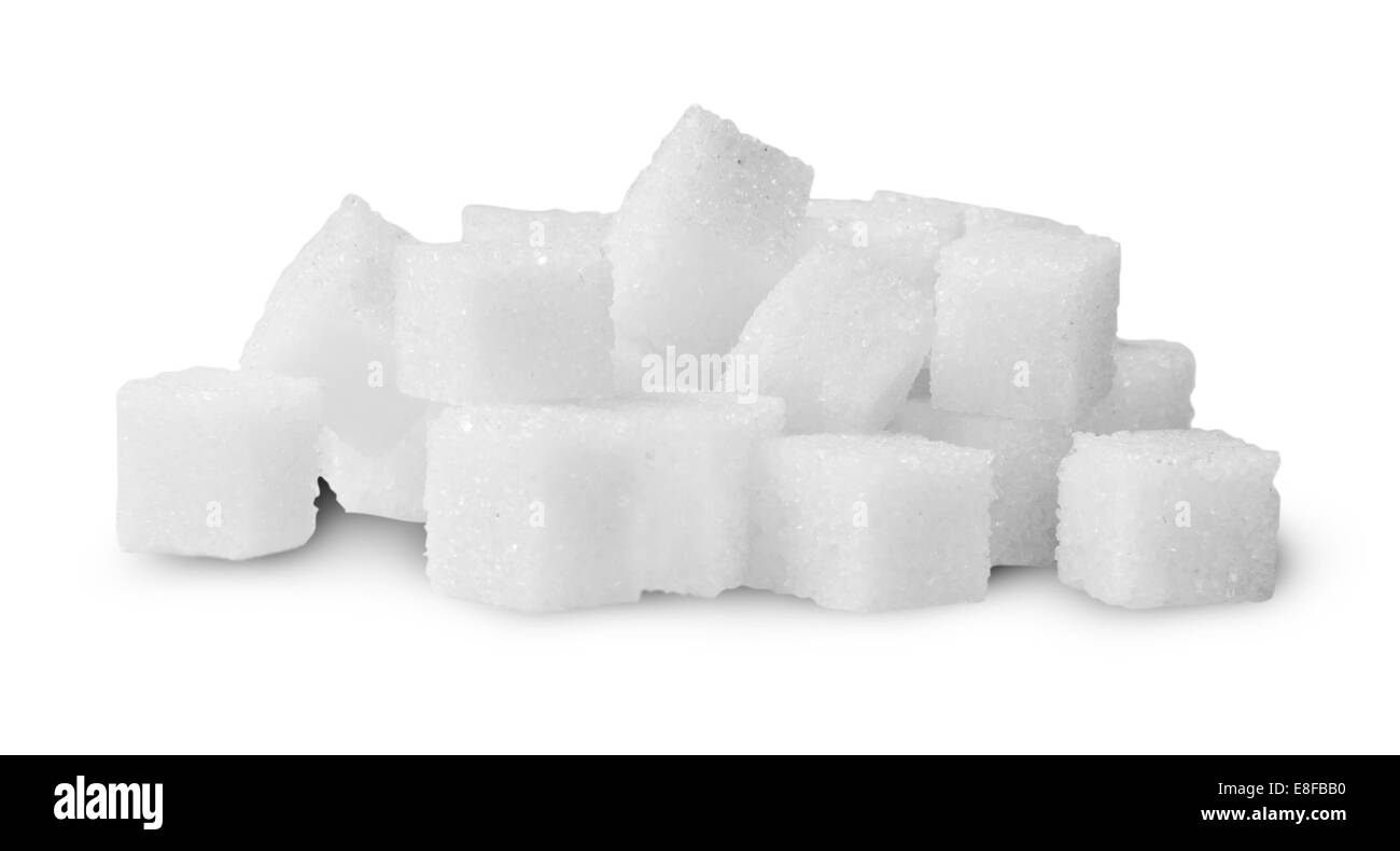 Haufen Zucker Würfel gedreht isolierten auf weißen Hintergrund Stockfoto