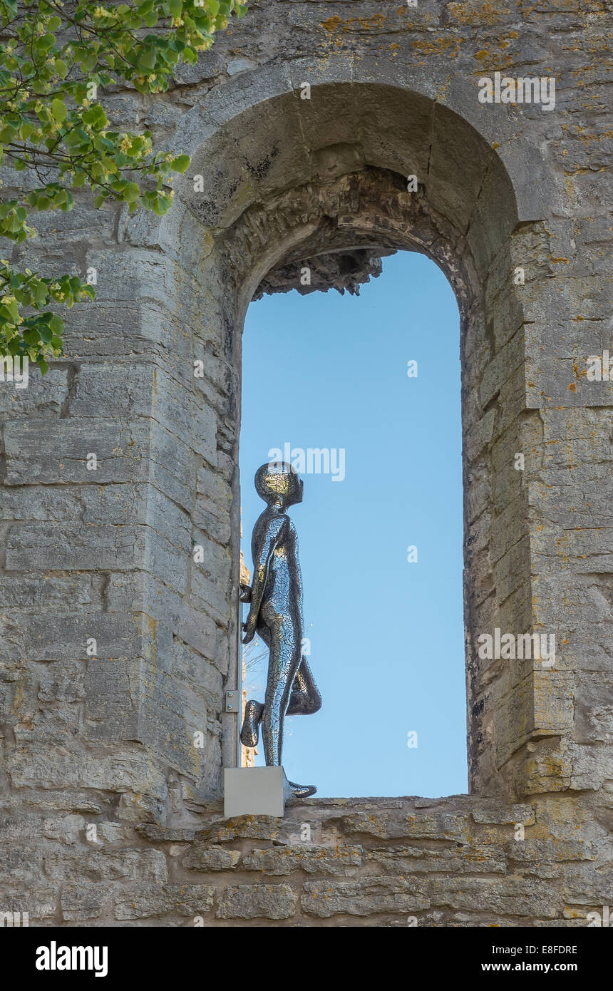 Metall-Statue des menschlichen im Fenster Stockfoto