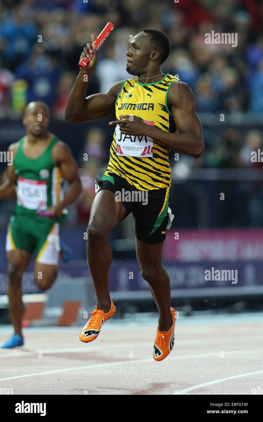 Usain Bolt leitet das Jamaika-Team die Goldmedaille. England nehmen der Silbermedaille und Trinidad und Tobago nehmen die Bronze-Medaille Stockfoto
