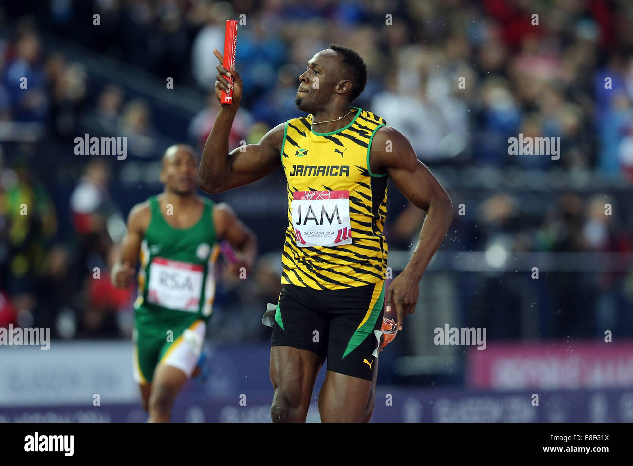 Usain Bolt leitet das Jamaika-Team die Goldmedaille. England nehmen der Silbermedaille und Trinidad und Tobago nehmen die Bronze-Medaille Stockfoto