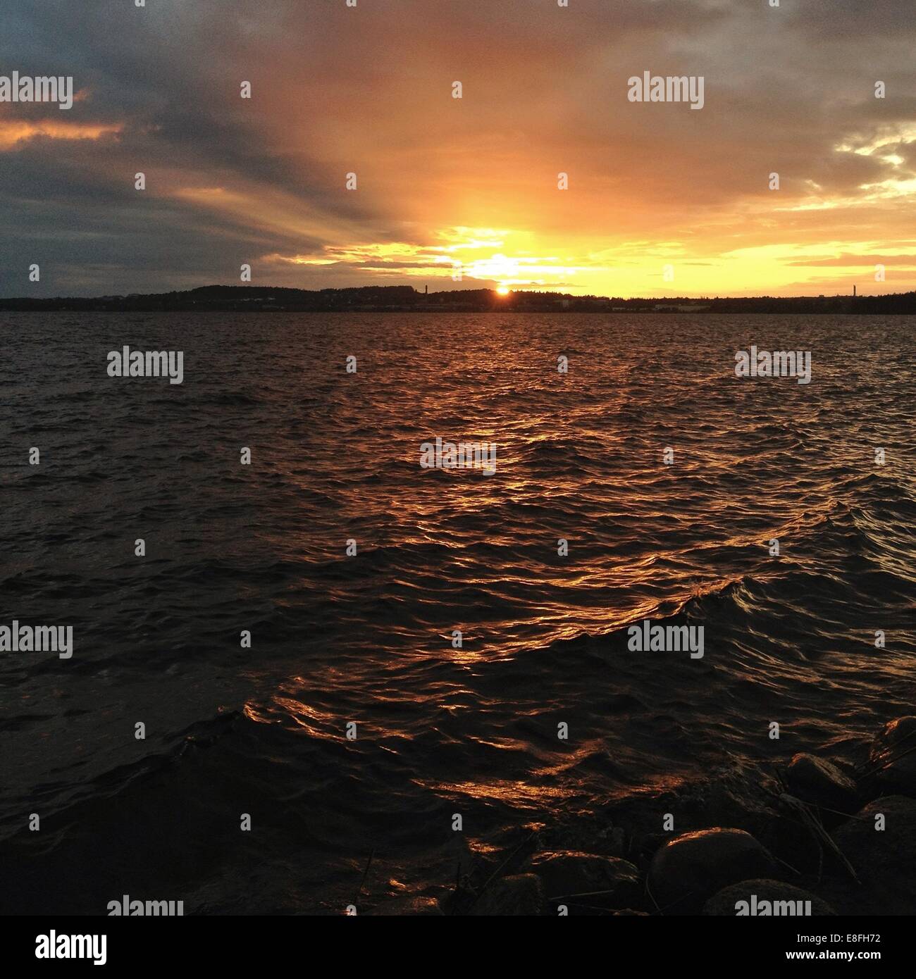 Sonnenuntergang über See Stockfoto