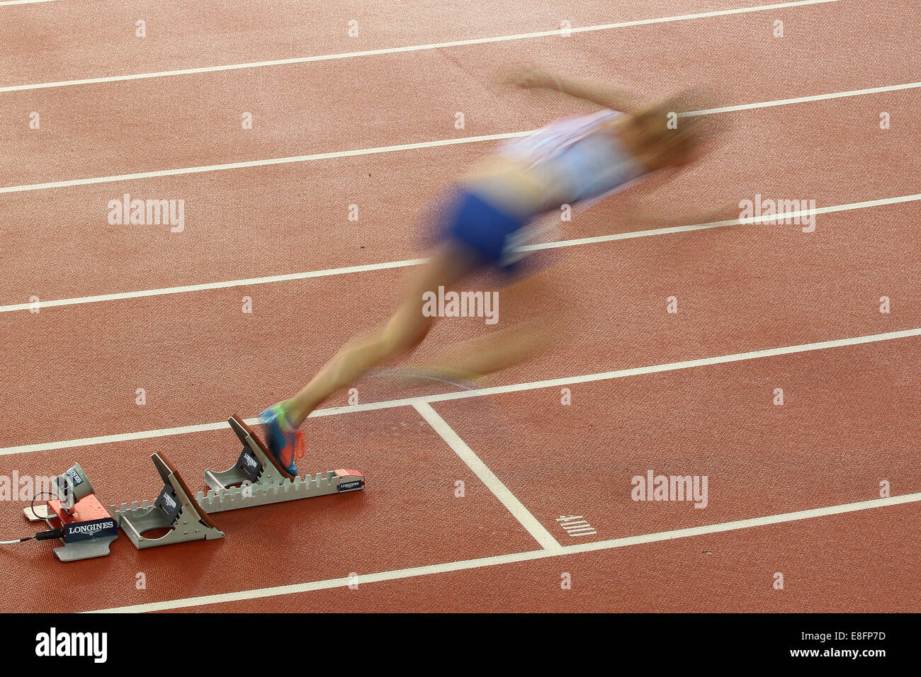 Motion Blur - Eilidh Kind (SCO) aus den Blöcken - Frauen 400 m Hürden Finale. Leichtathletik - Hampden Park - Glasgow - UK - 31/07 / Stockfoto