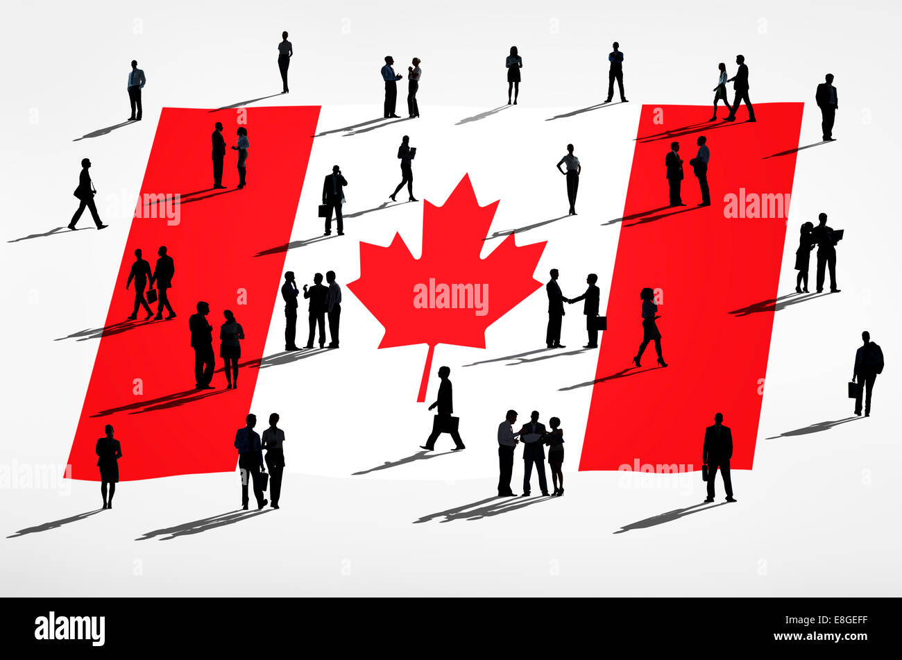Kanadische Flagge und eine Gruppe von Geschäftsleuten. Stockfoto