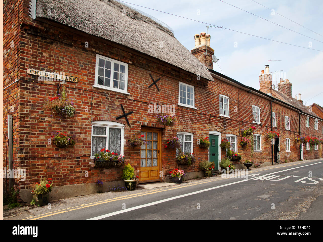 Grad II aufgeführten alte strohgedeckte Hütten auf Church Lane in Christchurch, Dorset Stockfoto