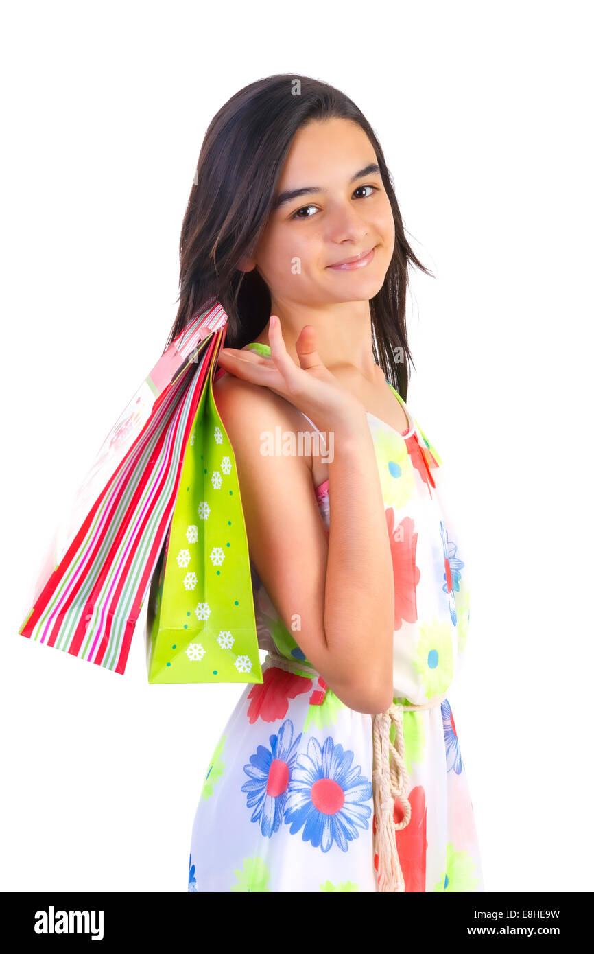 Teenager Mädchen lächelnd Holding Einkaufstaschen einkaufen. Closeup Portrait von schönen jungen Mädchen. Stockfoto