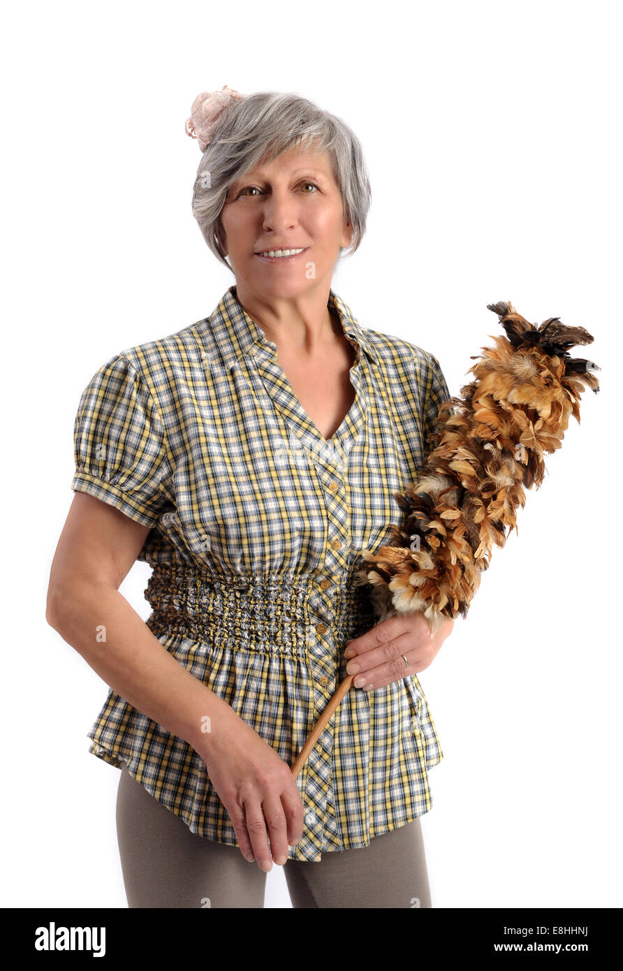 Frau mit Staubwedel Stockfoto