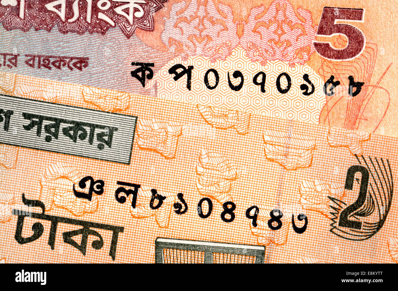 Detail aus Bangladesch Banknote zeigt bengalische Ziffern (Top - 0370958, Boden - 8904743) Stockfoto