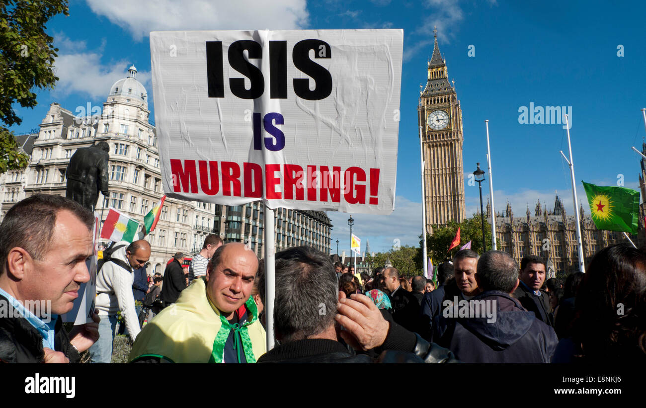 Parliament Square, London UK. 11. Oktober 2014.  Kurdische Demonstranten versammeln sich in Parliament Square in demonstrieren gegen die Ermordung Regime von ISIS, mangelnde Unterstützung beim Schutz der Kurden in der Stadt Kobane in Syrien und Welle anti-türkischen AKP-Regierung-Plakate.  Kathy DeWitt/Alamy Live-Nachrichten Stockfoto