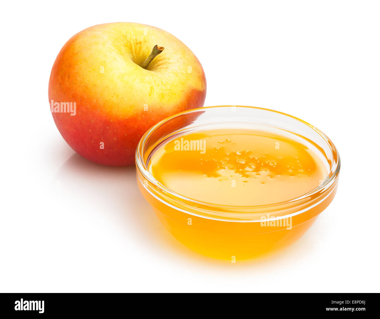Apfel und Honig isoliert Stockfoto