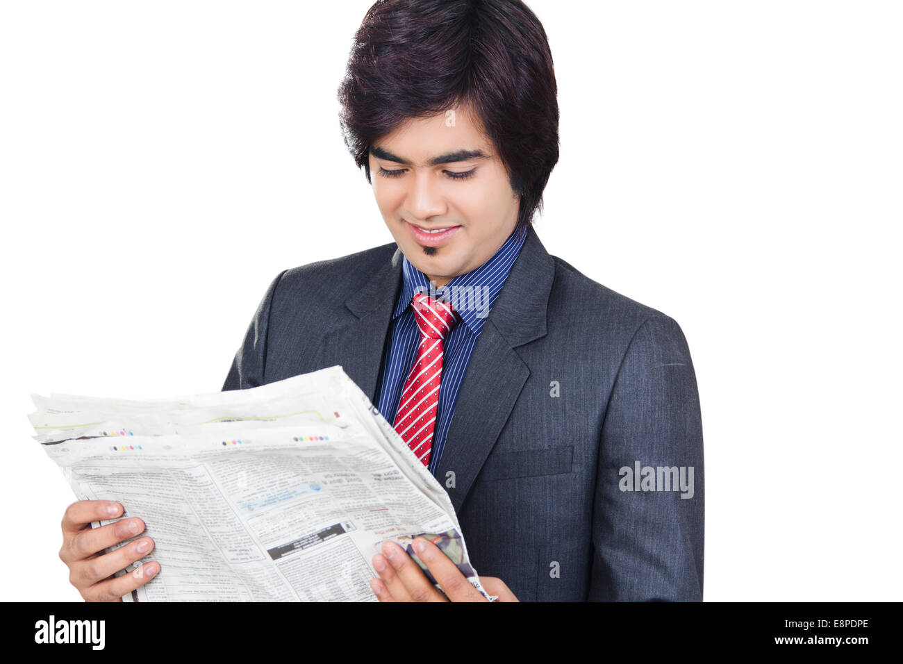 indischer Geschäftsmann lesen Zeitung Stockfoto