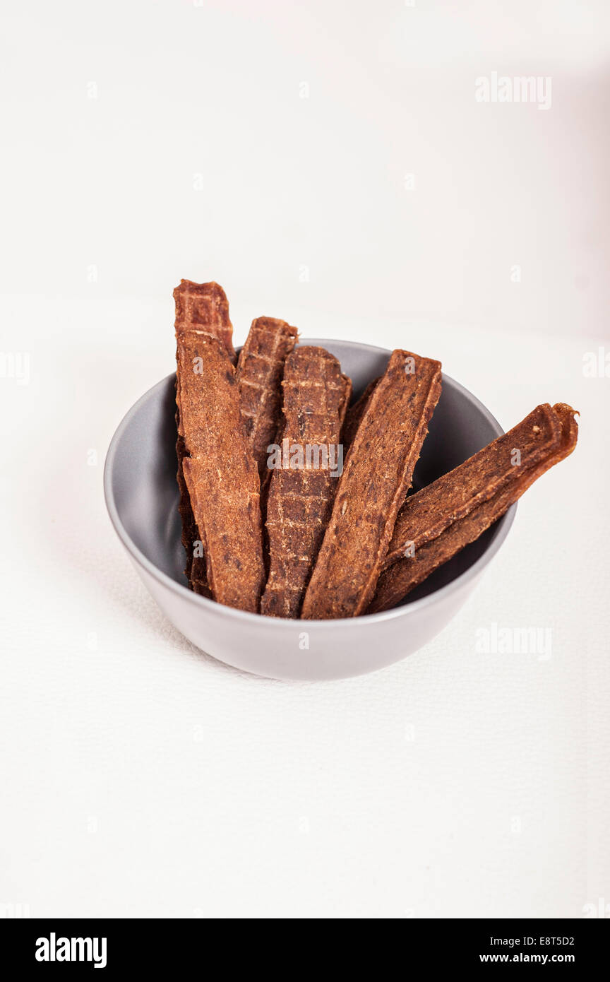 Hund Trockenfleisch Essen, Leckereien, Stockfoto