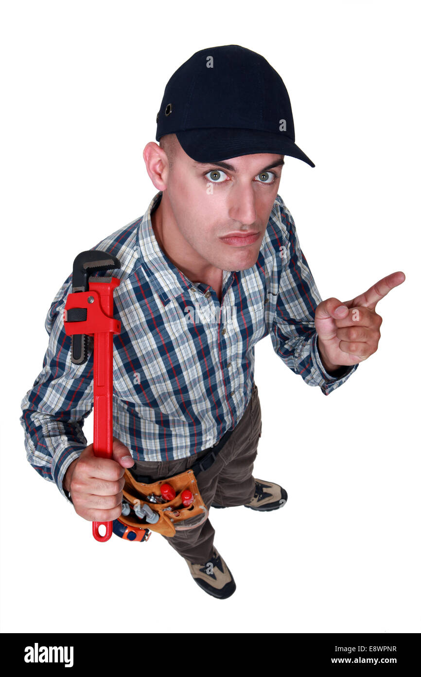 Grimmig aussehenden Arbeiter Stockfoto