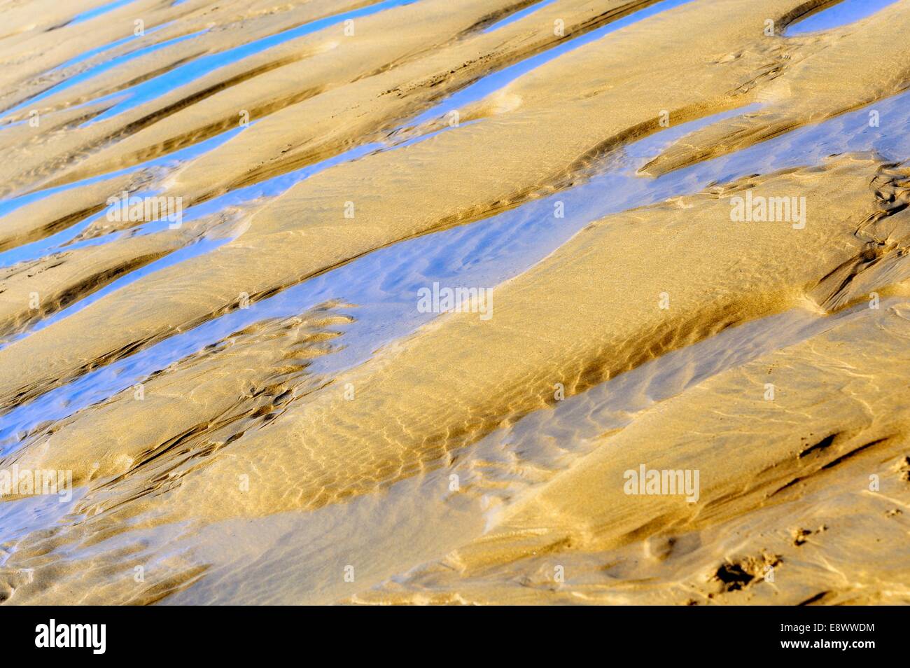 Strandsand und Wasser Pools abstrakte England uk Stockfoto