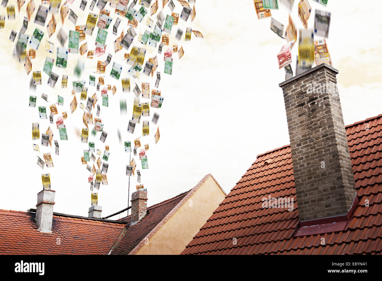 eine Menge Euro Geld fliegt die Schornsteine Stockfoto