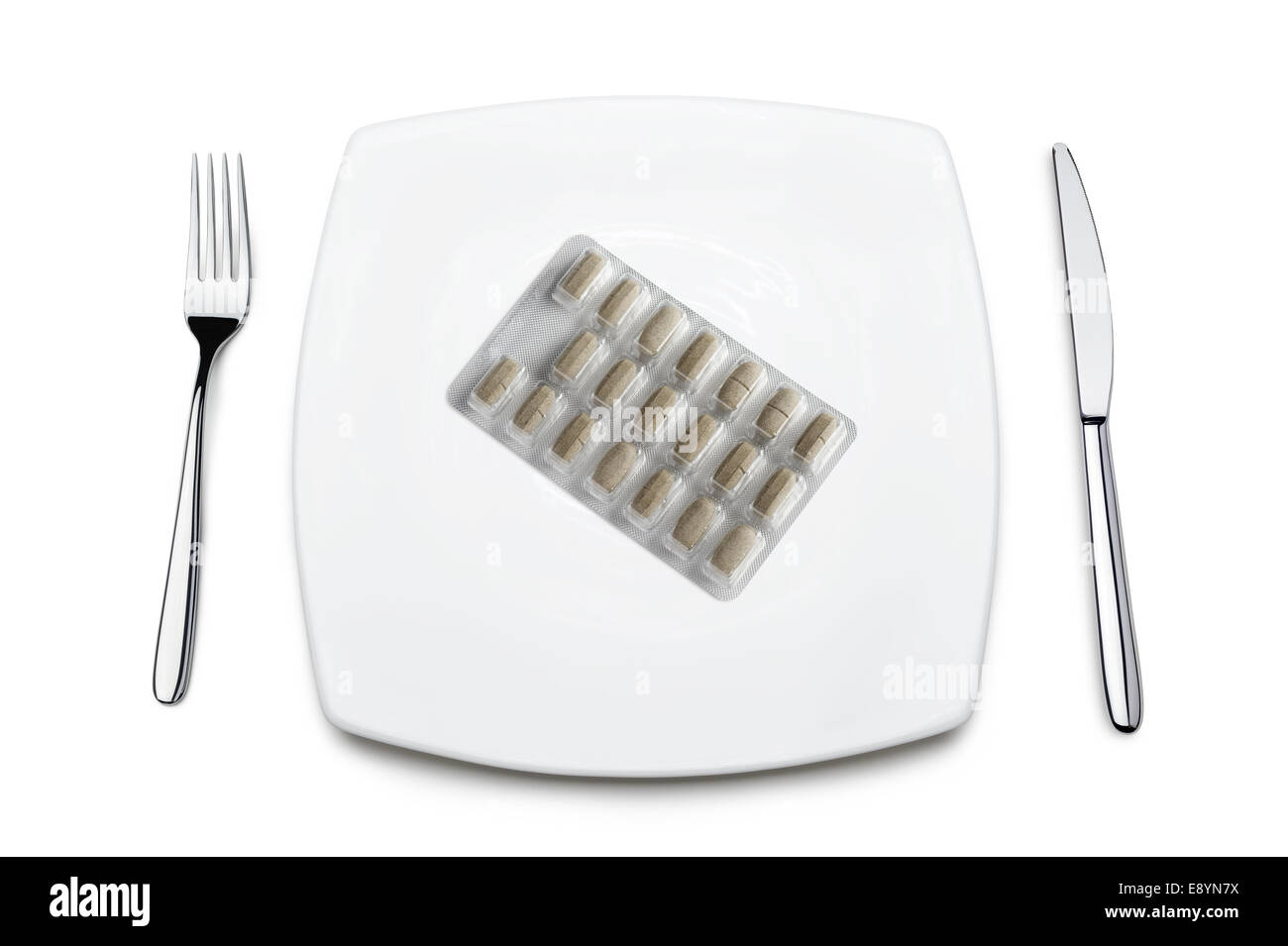 Diät-Pillen auf Platte, auf weißem Hintergrund Stockfoto