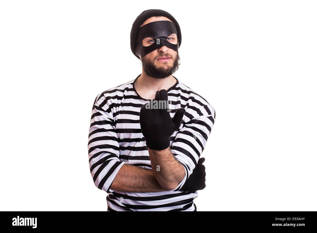 Schlaue Verbrecher mit Hand einladend. Porträt, isoliert auf weißem Hintergrund Stockfoto