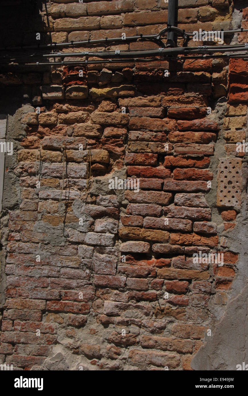 Italien. Venedig. alten Mauerwerk. Terrakotta. unregelmäßige Bau. Stockfoto
